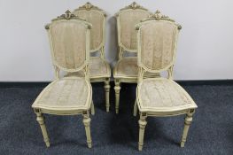 Four early 20th century cream and gilt French dining chairs
