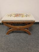 A continental carved oak tapestry seated stool,