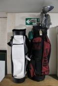 A Wilson golf bag containing Ben Sayer irons and assorted drivers together with a further Sunridge