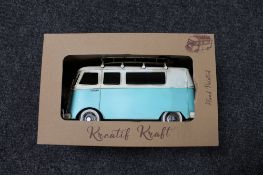 A boxed metal Kreatif Kraft camper van