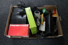 A box of assorted cameras, cine camera, camera accessories,