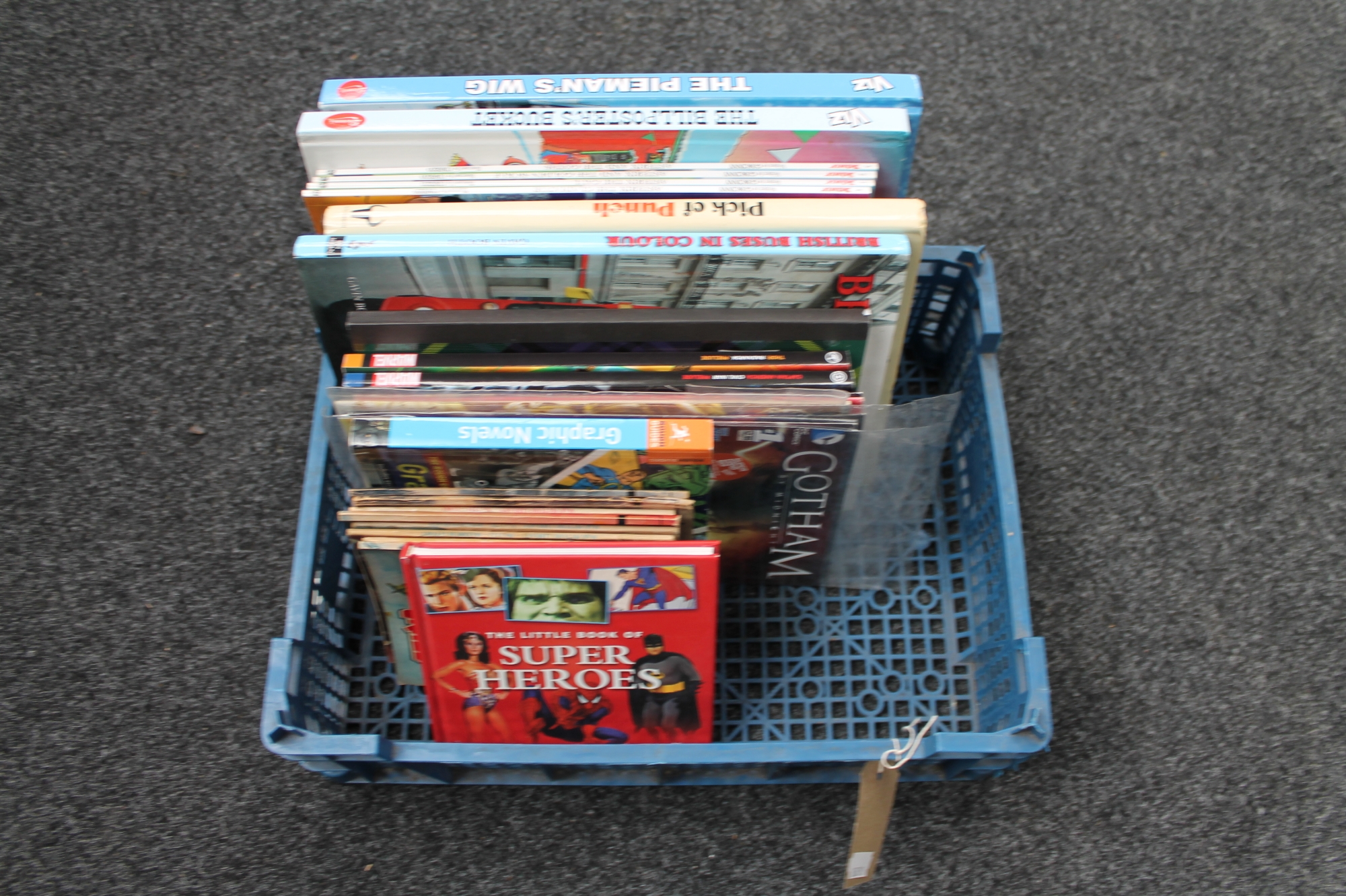 A basket of graphic novels, Viz annuals,