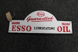 A cast iron sign - Esso lubricating oil