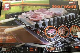 Thirty-six boxed Arrow Sear 'n Grill grill grates