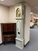 An antique painted cased longcase clock with brass dial by Christian Ipsen,