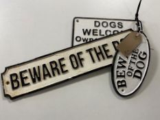 Three cast iron dog warning signs