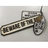 Three cast iron dog warning signs