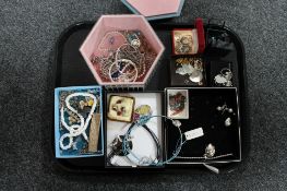 A tray of various silver and costume jewellery