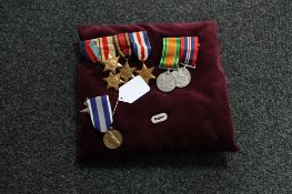 A WWII medal group comprising Africa, Burma, France and Germany, 1939-45 Stars, Defence Medal,