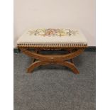 A continental carved oak tapestry seated stool,