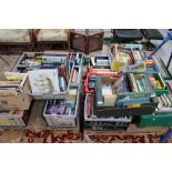 Two pallets containing assorted books - reference, heraldry, photography, novels,