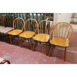 A set of four beech kitchen chairs