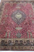 An axminster carpet 271 cm x 210 cm CONDITION REPORT: General wear and use but