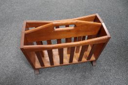 A teak magazine rack