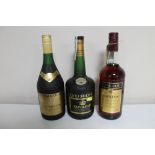 Two bottles of De Valcourt Napoleon French Brandy (1l and 100cl) together with a bottle of Duroc