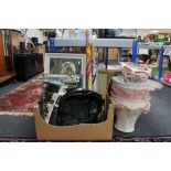 A box of two green fringed woolen hearth rugs, two brass lamps, shades, Moroccan leather stool,