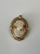 A 9ct gold mounted cameo brooch CONDITION REPORT: 6.2g gross.