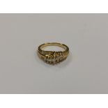 A 14ct gold marquise diamond set ring, size M CONDITION REPORT: 3.9g.