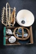 A wicker magazine rack containing folding tables, box of wicker hand basket, Scottish pottery bowl,