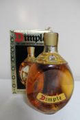 A bottle of John Haig Dimple Deluxe Scotch Whisky 26 2/3 fl. oz.