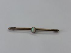 A 9ct gold opal bar brooch, 1.