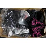 A box of Phaze mini skirts and flower lace tops etc