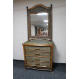 A bamboo and wicker four drawer chest with mirror CONDITION REPORT: Chest measures