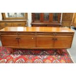 A mid 20th century long low sideboard,