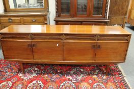 A mid 20th century long low sideboard,