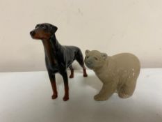 A Lladro figure of a polar bear together with a Beswick doberman