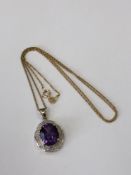 A 9ct gold amethyst pendant on chain, 3.