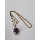 A 9ct gold amethyst pendant on chain, 3.
