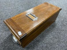 A wooden cash drawer