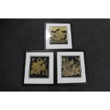 Three framed Indonesian fabric panels depicting warriors and gods