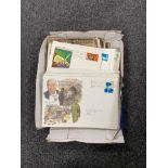 A box of twentieth century postcards and first day covers