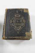 A nineteenth century leather bound family bible containing monochrome plates