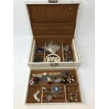 A jewellery box containing costume jewellery, silver filigree items,
