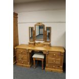 A good quality pine dressing table with stool and dressing mirror,