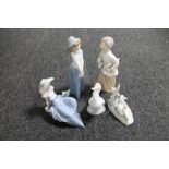 Five Nao figures - boy with scrolls, two female figures,