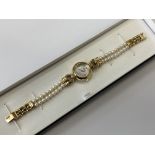 A lady's Misaki pearl quartz wristwatch with mother of pearl dial
