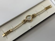 A lady's Misaki pearl quartz wristwatch with mother of pearl dial