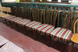 A set of six continental rail backed chairs in striped fabric