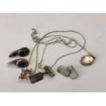 A silver locket on chain,
