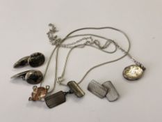 A silver locket on chain,