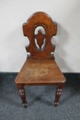 A Victorian mahogany hall chair (as found)