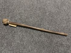 A wire-bound hardwood Zulu knobkerrie