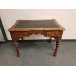 A Victorian mahogany two drawer desk,