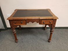 A Victorian mahogany two drawer desk,