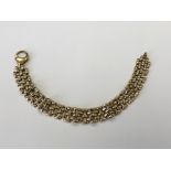 A 9ct gold bracelet, length 19.5cm, 11.3g.