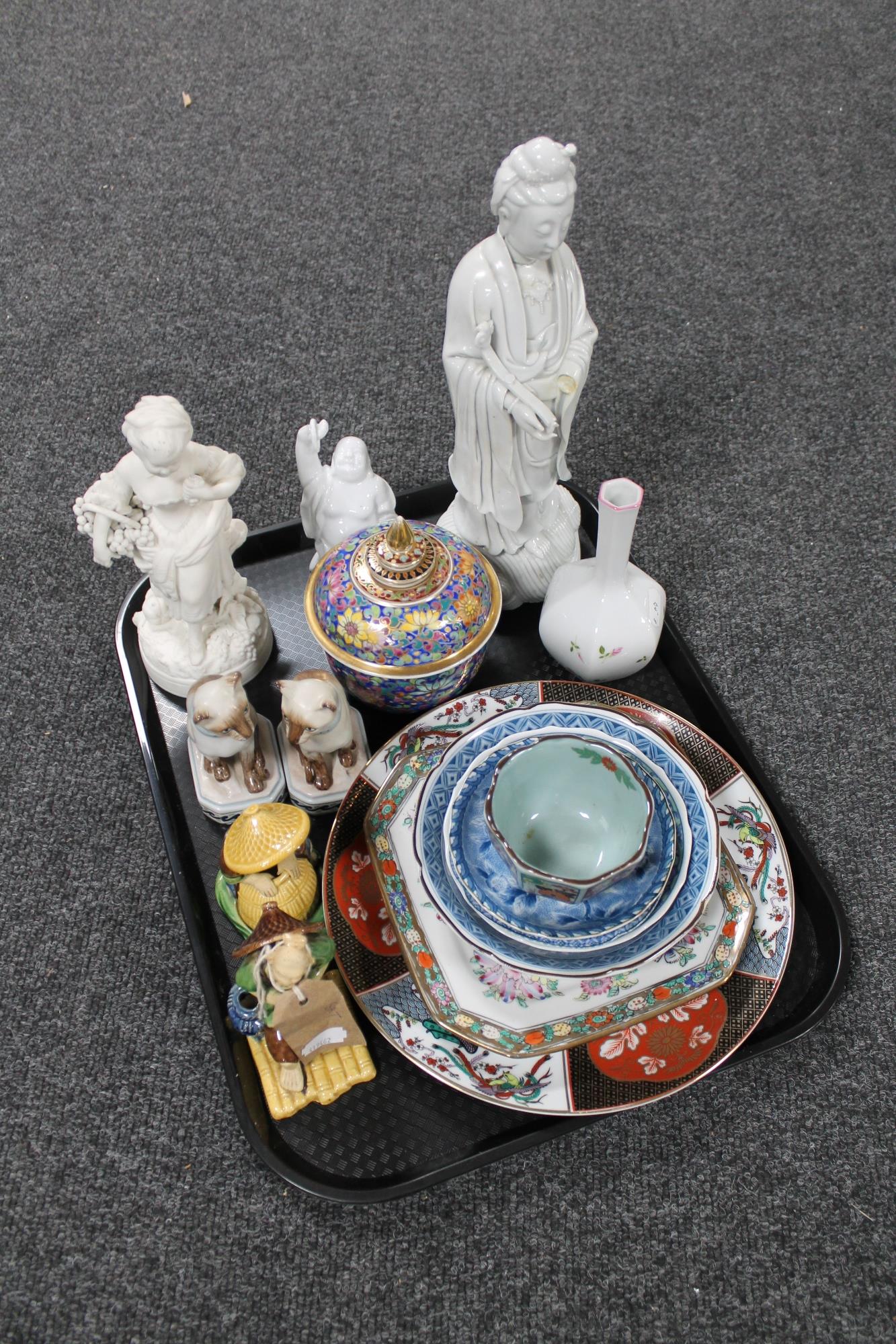 A tray of Parian figure of a girl with basket, Oriental figures,